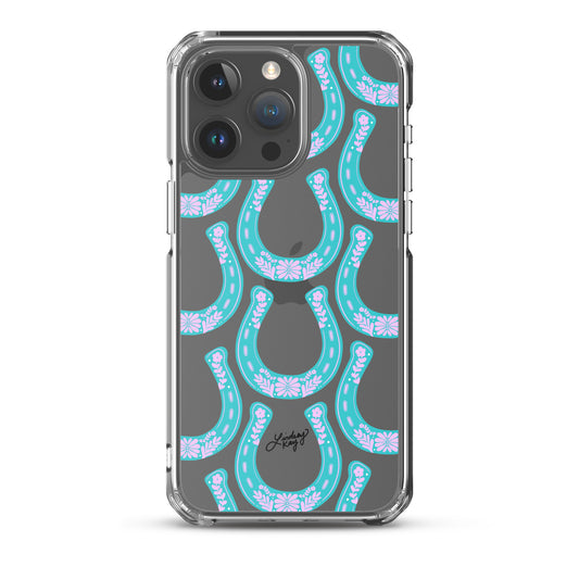 Clear iPhone case with hand-drawn turquoise western horseshoe pattern, designed by Lindsey Kay Collective. Cute and durable case for country girl style, available in all iPhone sizes.