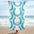 Hand illustrated western beach towel by Lindsey Kay Collective. Features bold turquoise western-inspired horseshoe design, sized 30×60 inches. Made of soft polyester-cotton blend with absorbent white terry cloth backing. Perfect for beach days, poolside, or summer gifts for cowgirls.