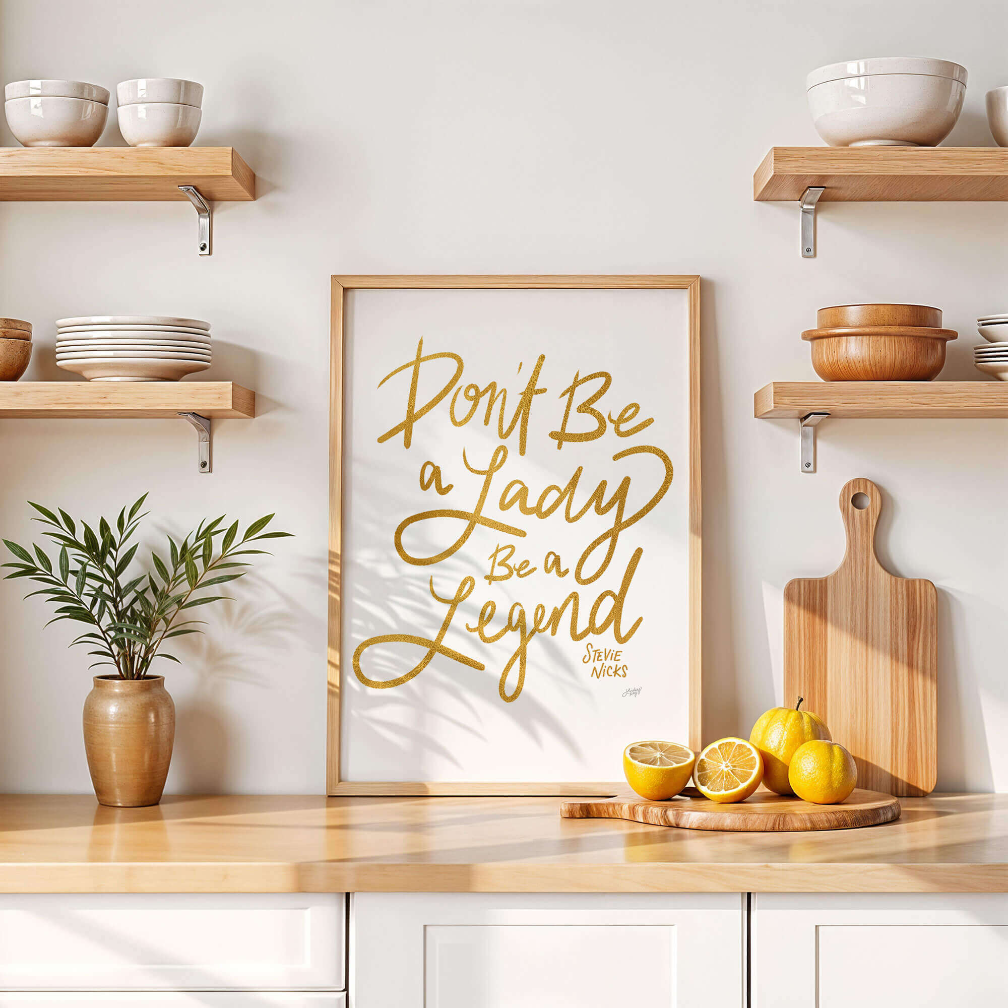Hand-lettered Stevie Nicks quote art print Don’t Be a Lady Be a Legend by Lindsey Kay Collective – empowering inspirational wall art – available in gold/white, pink, pastel purple/green, and black/purple color palettes – perfect for female empowerment gifts, office decor, dorm rooms, or gallery walls – printed on enhanced matte paper with vibrant inks – available in 10 sizes