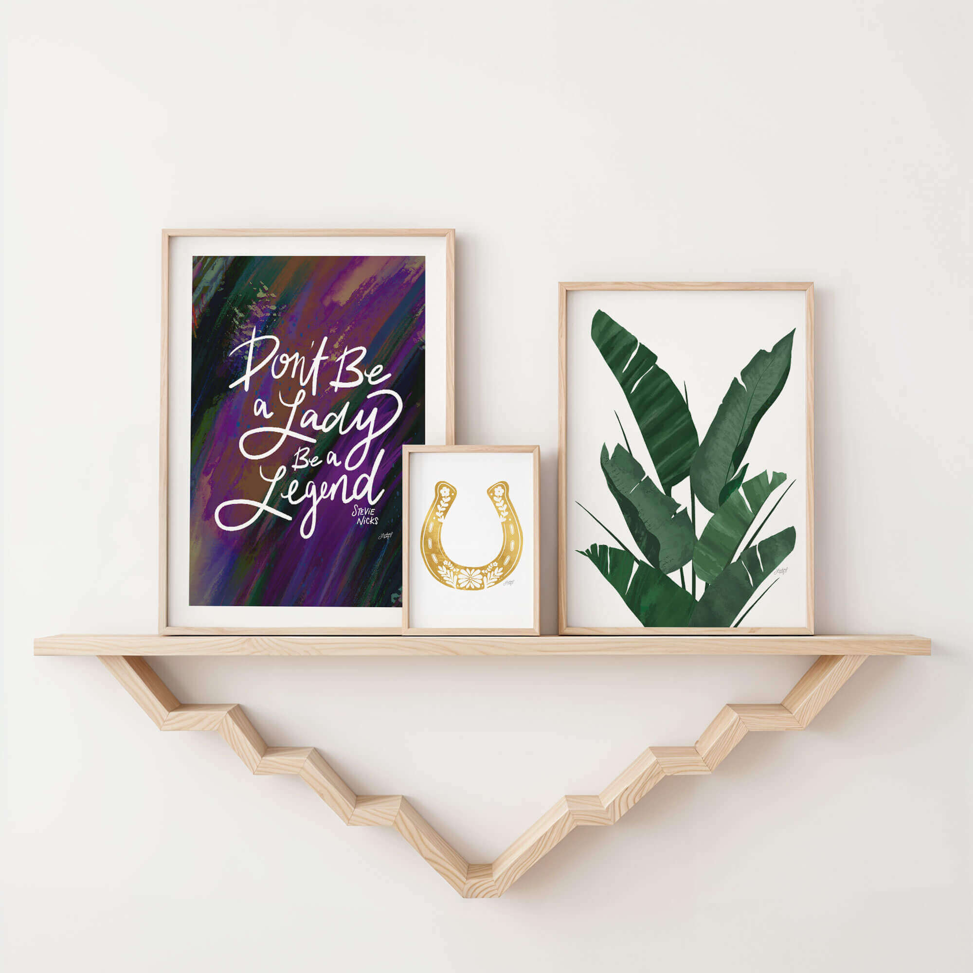 Hand-lettered Stevie Nicks quote art print Don’t Be a Lady Be a Legend by Lindsey Kay Collective – empowering inspirational wall art – available in gold/white, pink, pastel purple/green, and black/purple color palettes – perfect for female empowerment gifts, office decor, dorm rooms, or gallery walls – printed on enhanced matte paper with vibrant inks – available in 10 sizes