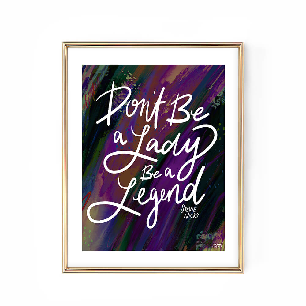 Hand-lettered Stevie Nicks quote art print Don’t Be a Lady Be a Legend by Lindsey Kay Collective – empowering inspirational wall art – available in gold/white, pink, pastel purple/green, and black/purple color palettes – perfect for female empowerment gifts, office decor, dorm rooms, or gallery walls – printed on enhanced matte paper with vibrant inks – available in 10 sizes