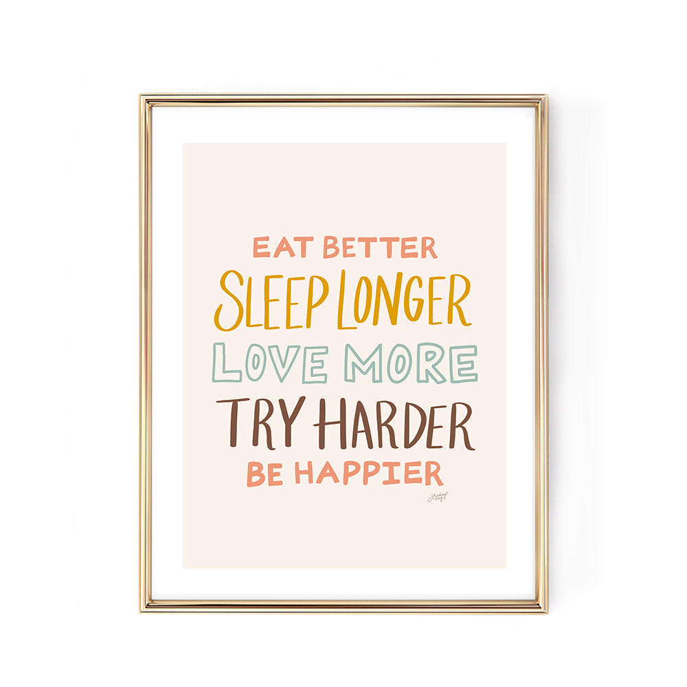 Framed motivational poster with colorful text on a white background