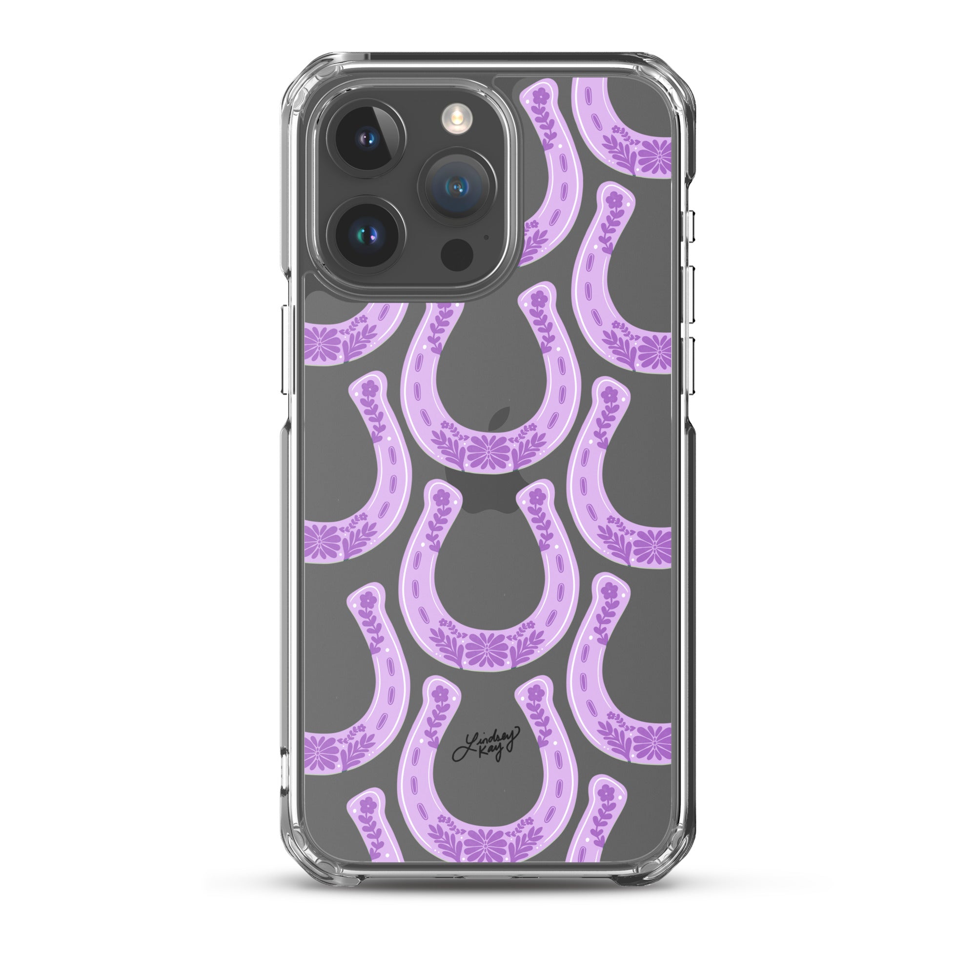 Clear iPhone case with hand-drawn purple western horseshoe pattern, designed by Lindsey Kay Collective. Cute and durable case for country girl style, available in all iPhone sizes.

