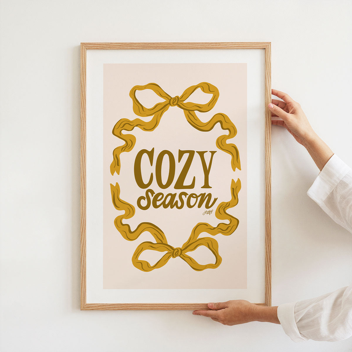 Hand-lettered Cozy Season art print with gold ribbon lettering by Lindsey Kay Collective – fall wall decor for cozy autumn spaces or gallery walls – printed on enhanced matte paper with vibrant inks – available in 10 sizes