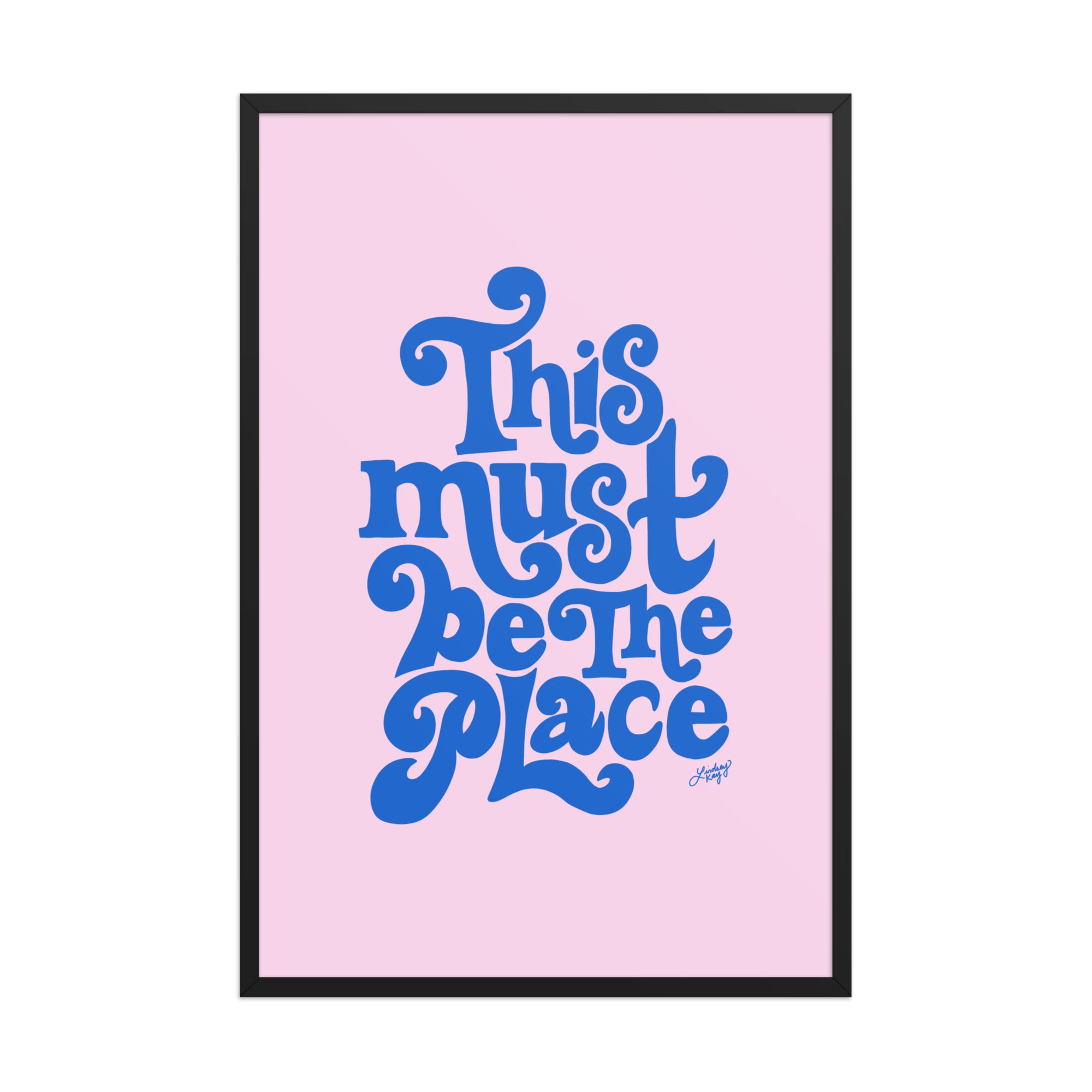Framed matte art print with hand-lettered quote “This Must Be The Place” in vibrant colors, Lindsey Kay Collective wall art, gallery wall decor