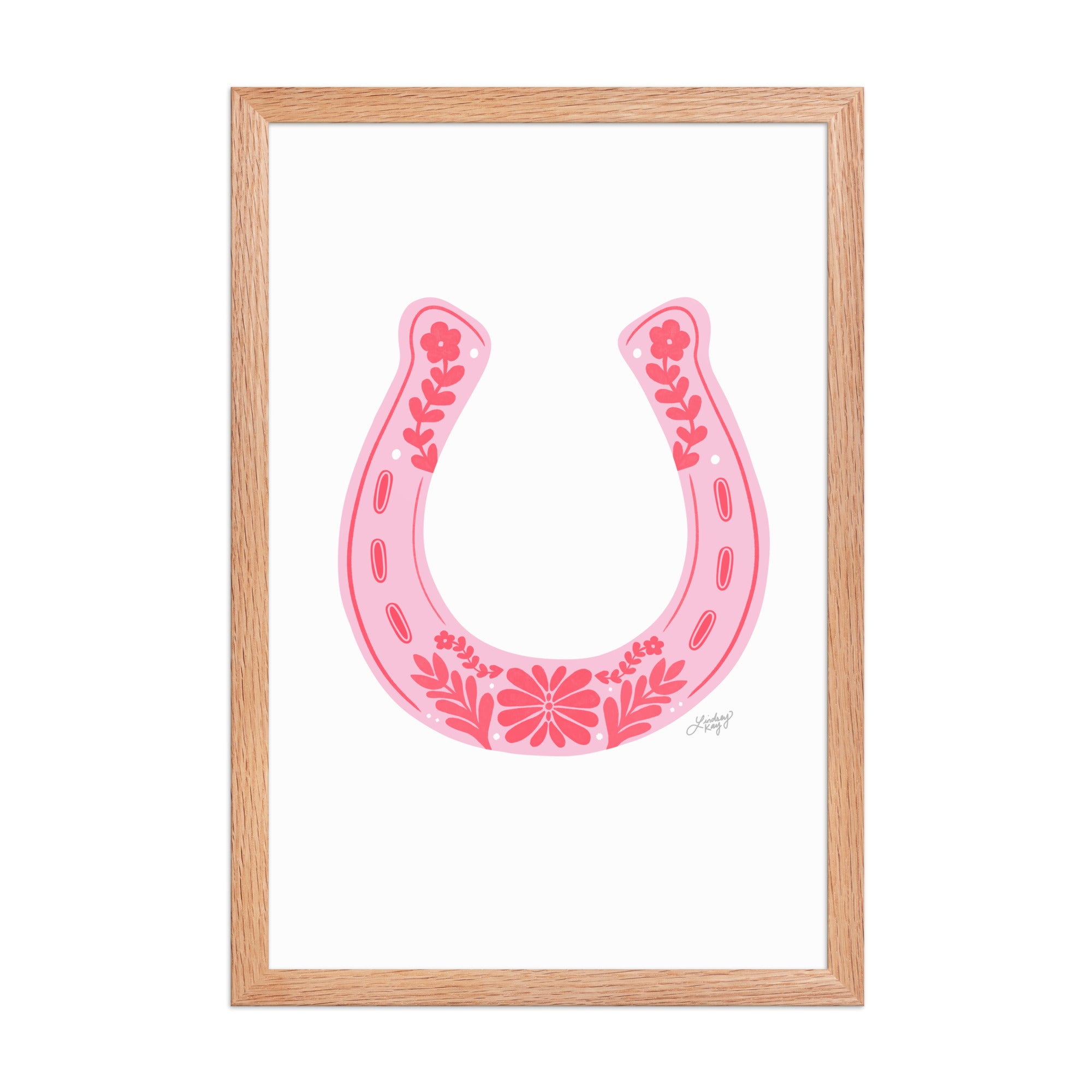 Framed hand-illustrated floral horseshoe art print on matte paper, available in white, brown, and black high-quality wood frames, rustic Western wall decor.