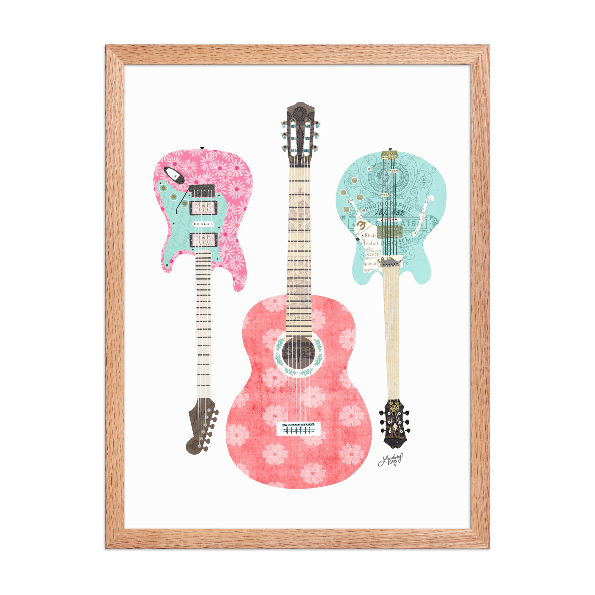 Hand-illustrated collage of pink and blue guitars crafted from vintage paper, framed retro wall art for music lovers