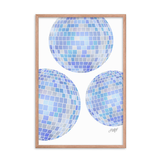 Framed hand-illustrated art print of three colorful disco balls on matte paper, available in white, brown, and black high-quality wood frames, retro wall decor.