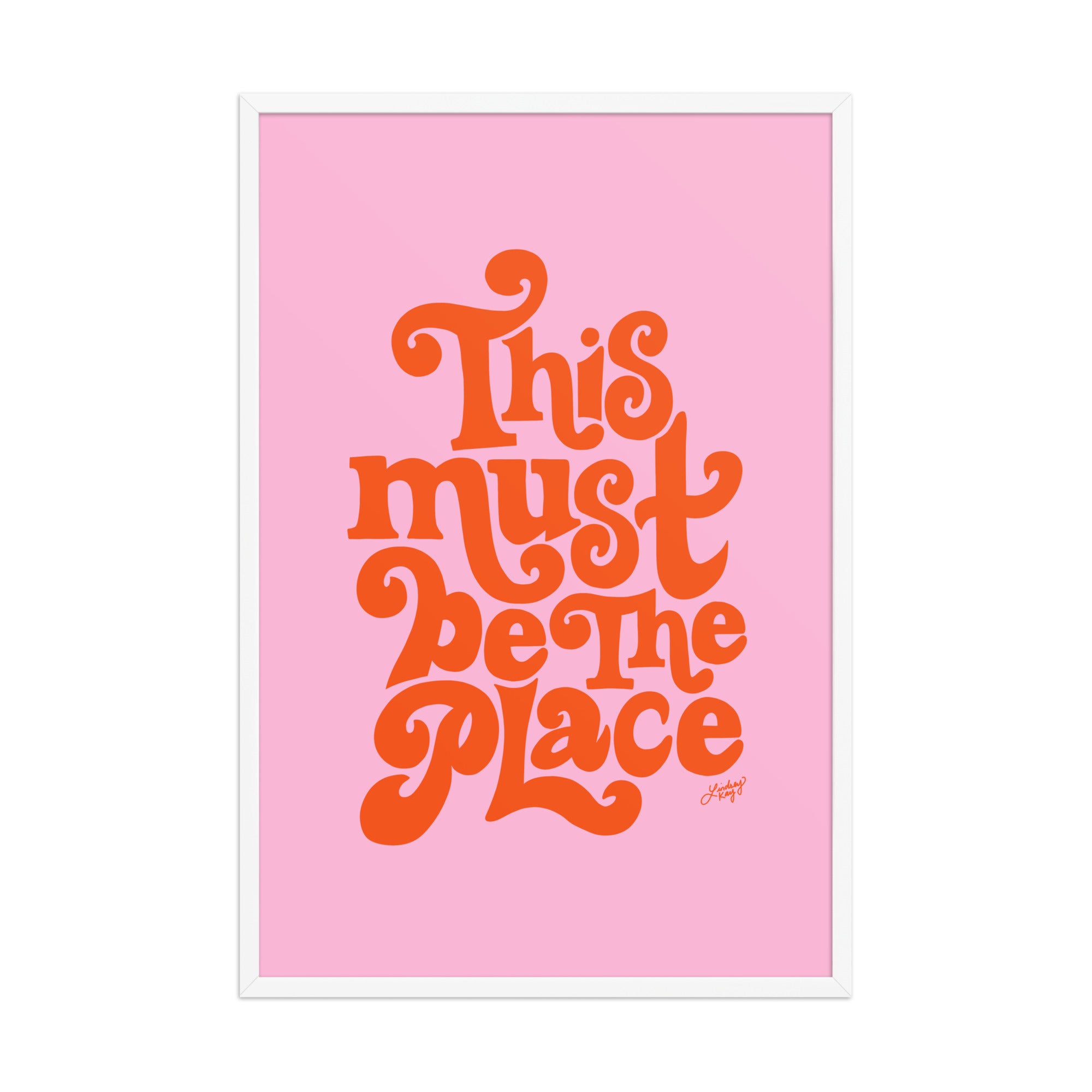 Framed matte art print with hand-lettered quote “This Must Be The Place” in vibrant colors, Lindsey Kay Collective wall art, gallery wall decor