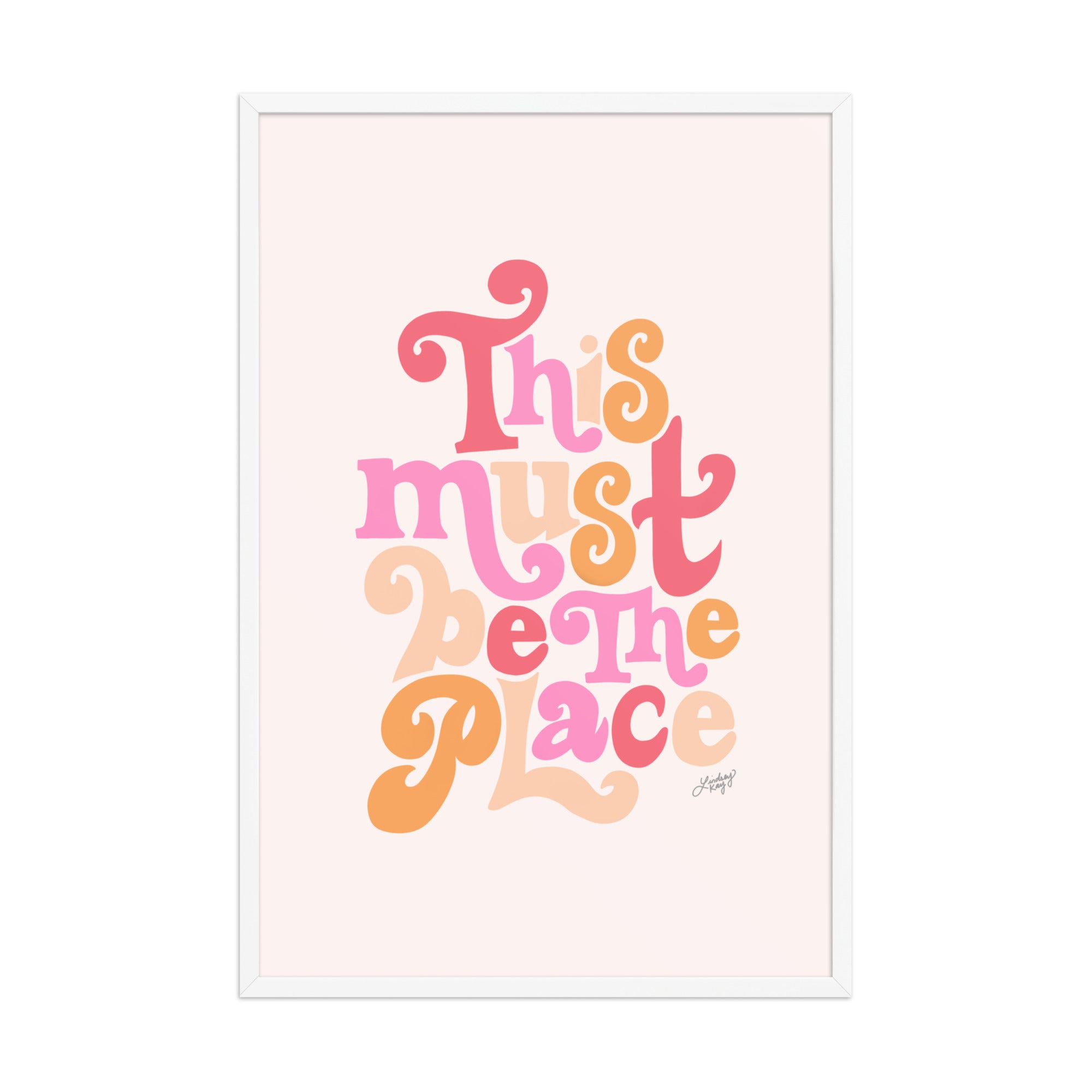 Framed matte art print with hand-lettered quote “This Must Be The Place” in vibrant colors, Lindsey Kay Collective wall art, gallery wall decor