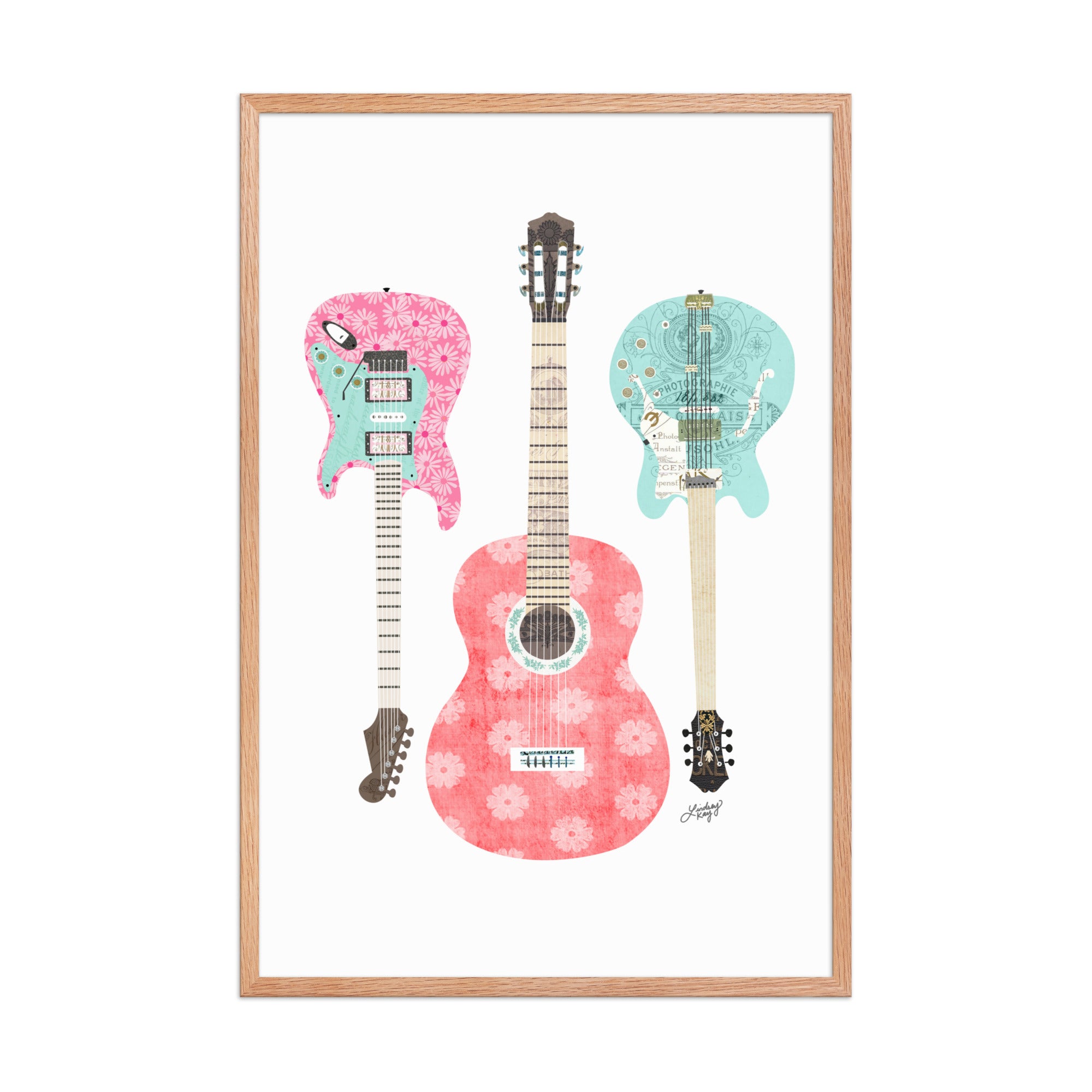 Hand-illustrated collage of pink and blue guitars crafted from vintage paper, framed retro wall art for music lovers