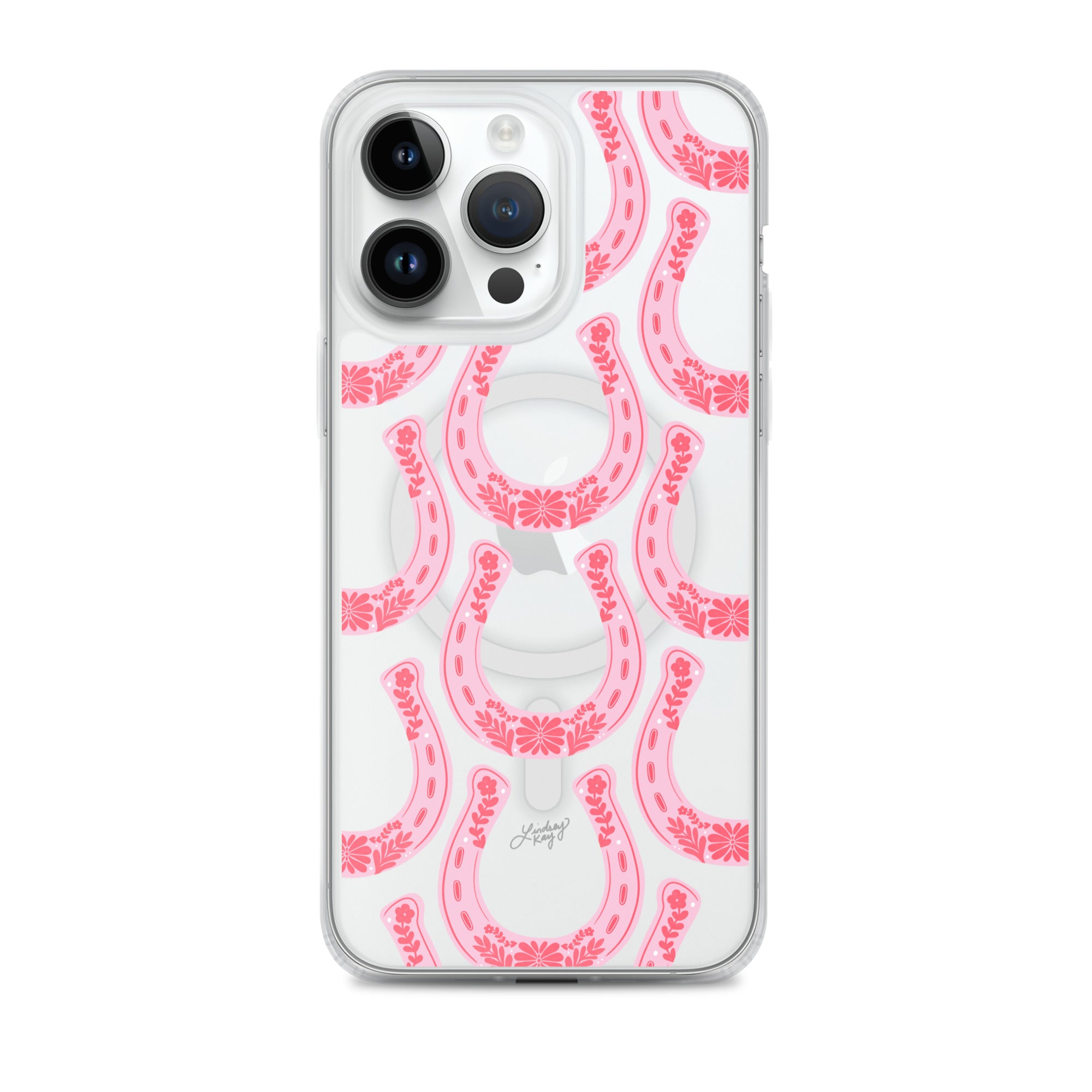 Clear MagSafe iPhone case with hand-drawn pink western horseshoe pattern, designed by Lindsey Kay Collective. Cute and durable case for country girl style, available in all iPhone sizes.

