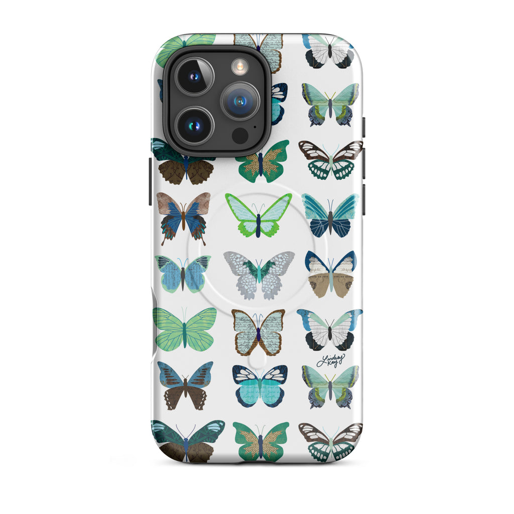 Cute and durable Magsafe iPhone case with a hand-drawn cute green and blue butterflies pattern in red, perfect for summer with a fun, girly, and trendy retro vibe.