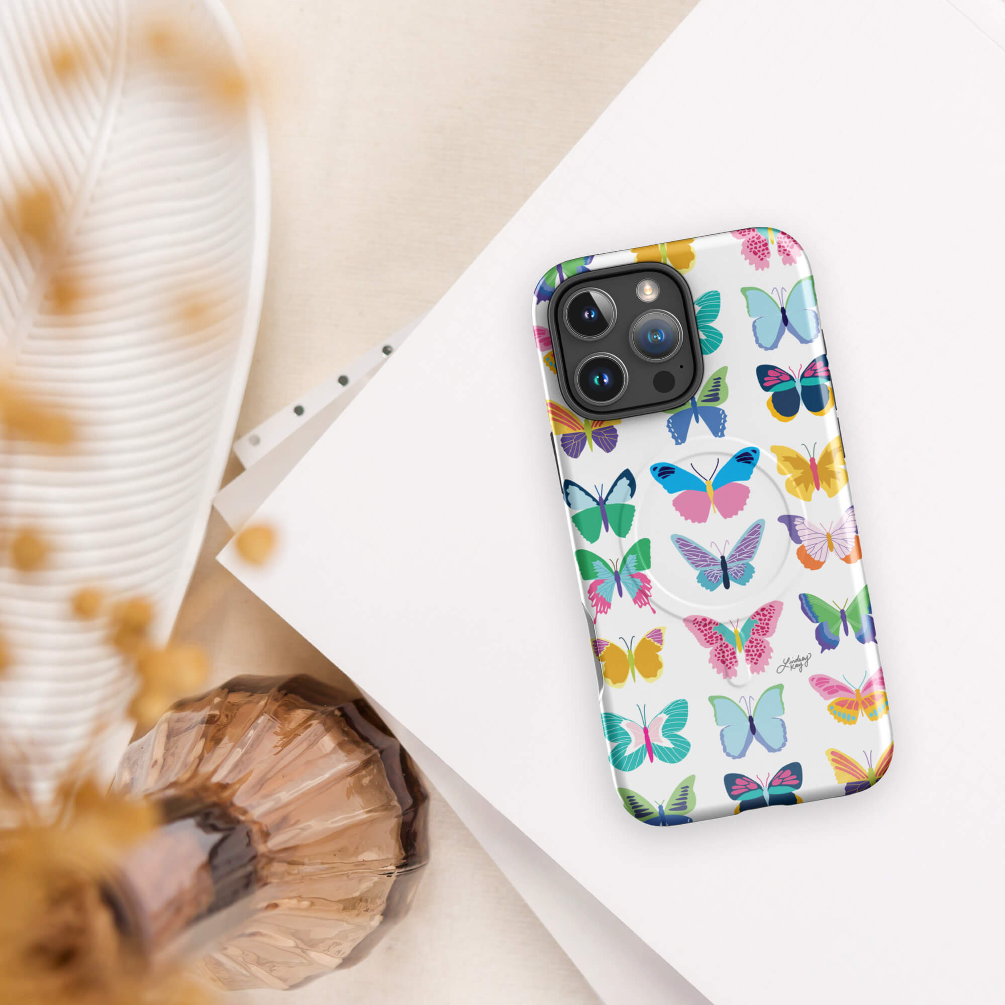 Hand-illustrated rainbow butterfly iPhone case – colorful girly design, durable MagSafe cover by Lindsey Kay Collective