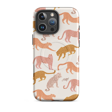 Stylish MagSafe iPhone case with pink background and warm colored leopard pattern, designed by Lindsey Kay Collective – modern animal print phone accessory for Apple devices.