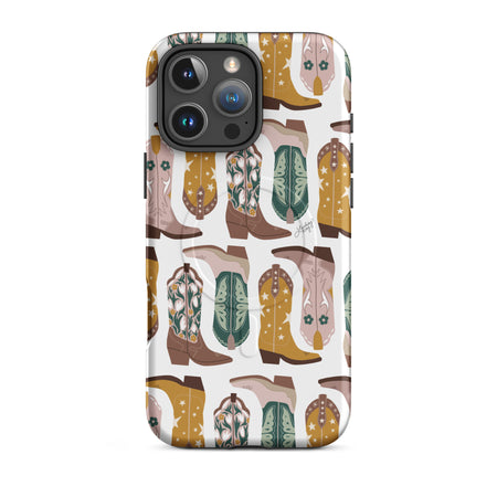 Stylish MagSafe iPhone case with green brown and yellow cowgirl boots pattern, designed by Lindsey Kay Collective – modern western print phone accessory for Apple devices.
