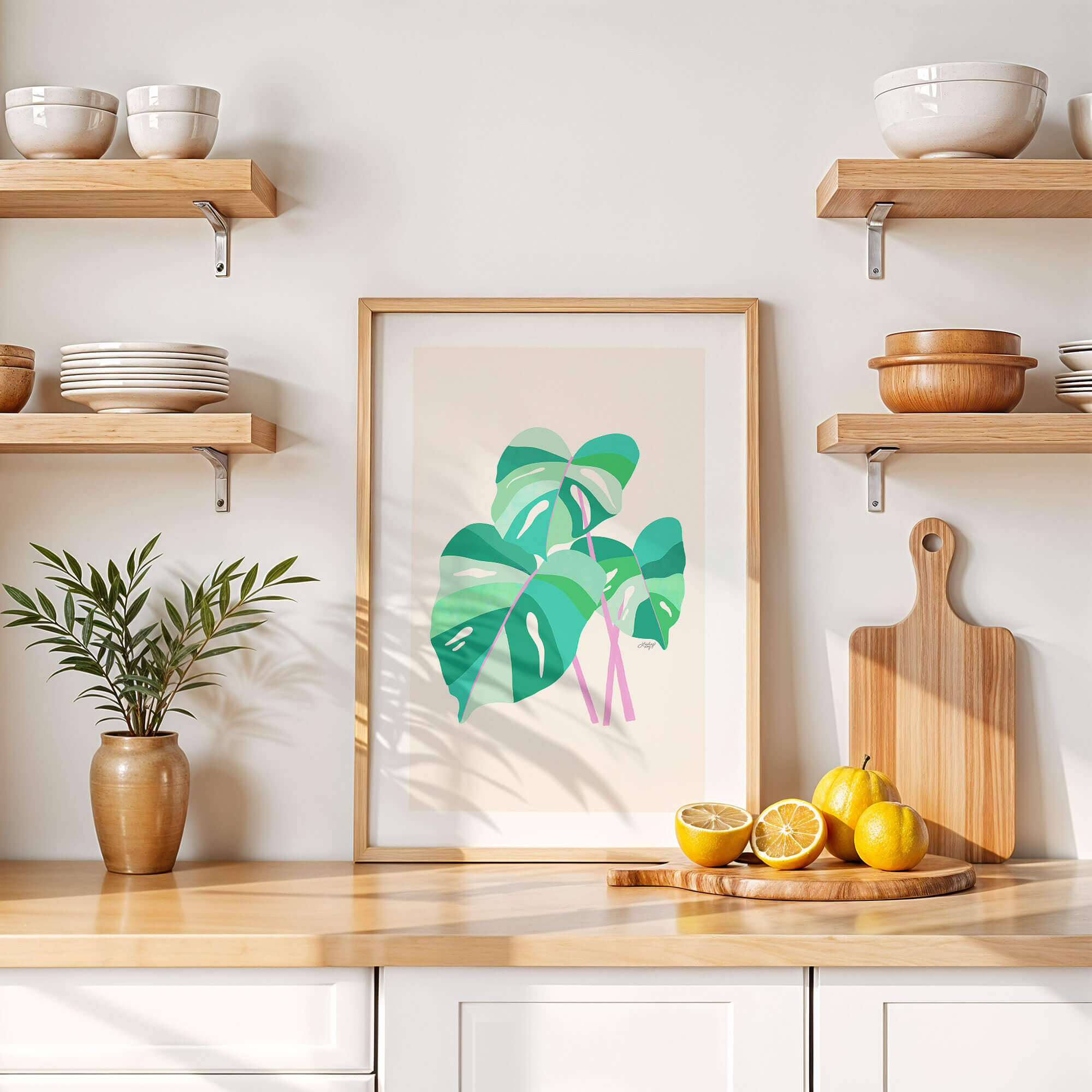 Hand-illustrated monstera plant art print by Lindsey Kay Collective – tropical plant wall art available in light green/lilac or pink/orange palettes – perfect for plant lovers, gallery walls, or colorful home decor – printed on enhanced matte paper with vibrant inks – available in 10 sizes