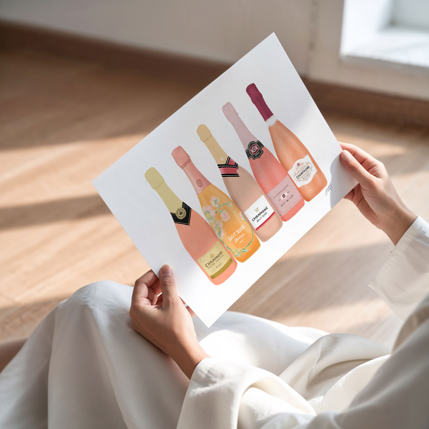 Hand drawn champagne bottles art print by Lindsey Kay Collective. Perfect for bar cart décor, kitchen walls, or gallery displays. Printed on enhanced matte paper and available in multiple sizes. Stylish gift for champagne lovers and party hosts.