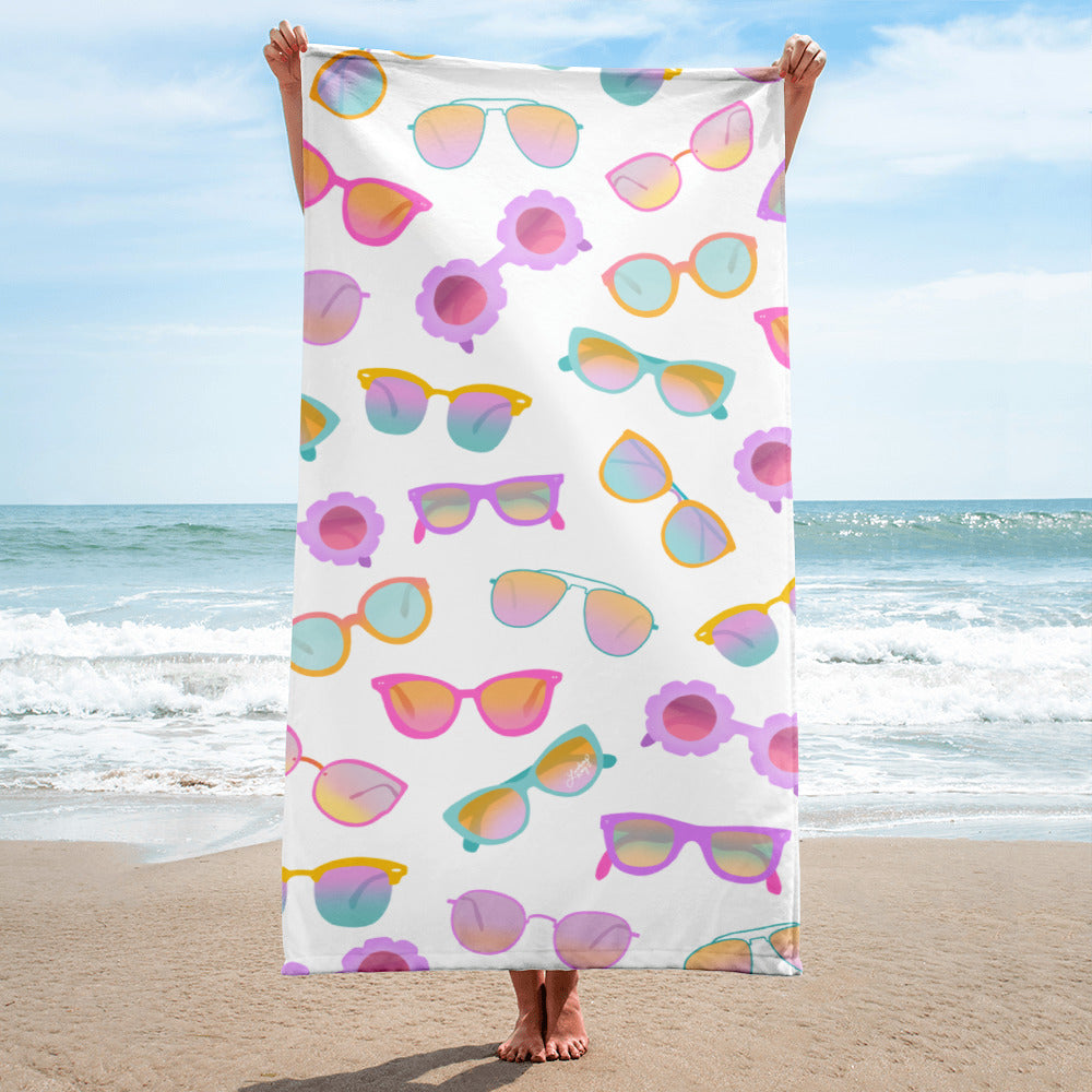 Patterned retro beach towel featuring pastel hand-drawn sunglasses, perfect for summer pool days or beach outings