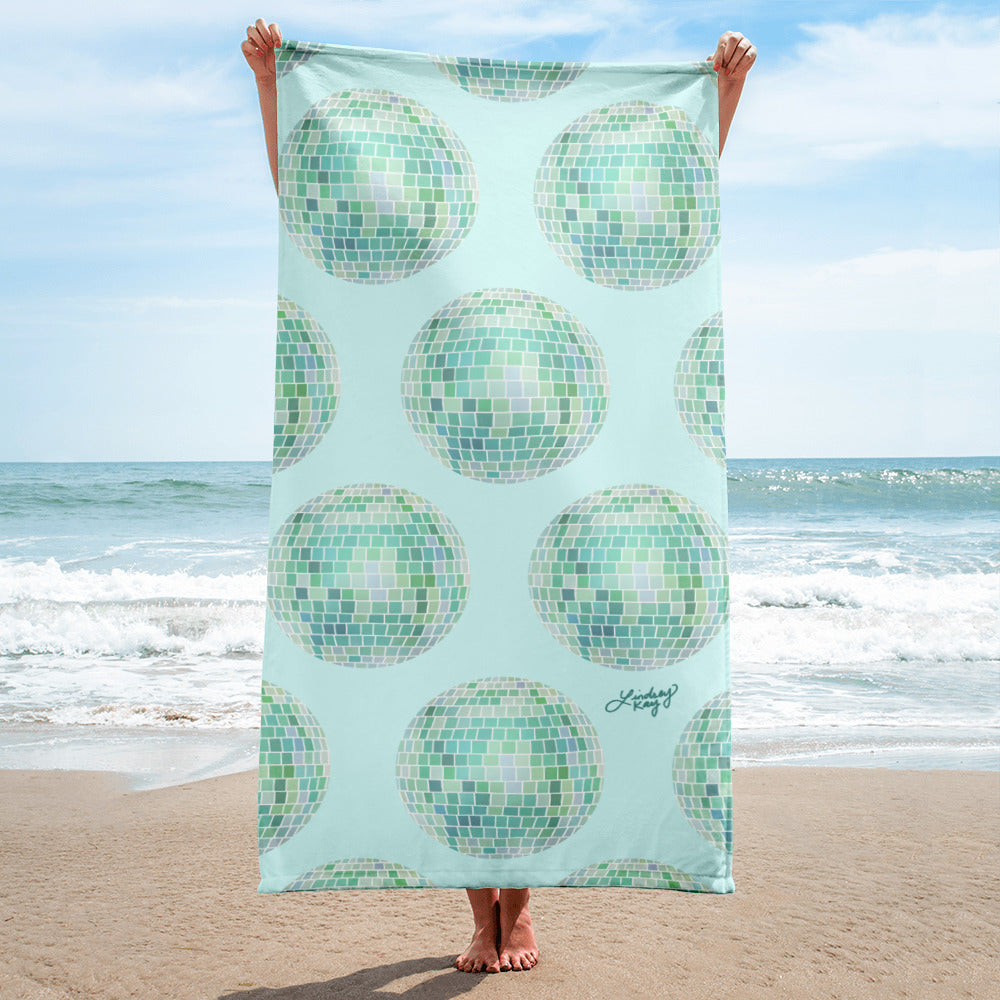 Hand-drawn green disco ball beach towel by Lindsey Kay Collective. Retro aesthetic towel for pool days, funky bachelorette gifts, summer beach essentials, and trendy vintage-inspired decor. 30x60 cotton polyester towel for disco lovers and party girls.