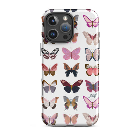 Cute and durable iPhone case with a hand-drawn cute green and blue butterflies pattern in red, perfect for summer with a fun, girly, and trendy retro vibe.