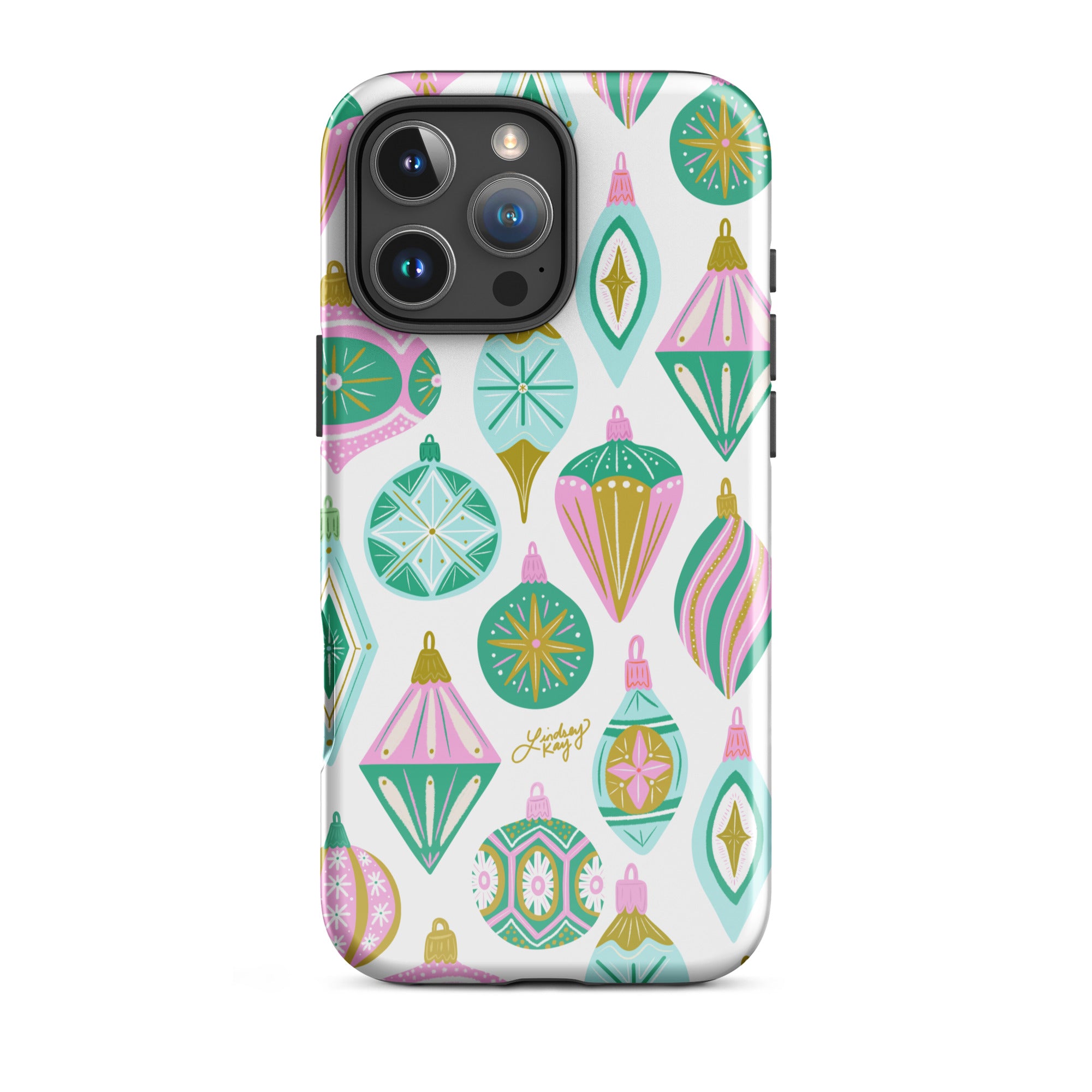 Hand-drawn retro Christmas ornament iPhone case in pastel green, pink, blue, and gold. Festive holiday phone case available in Clear, Tough, MagSafe Clear, and MagSafe Tough for iPhone 11 through iPhone 17. Durable, protective, and illustrated by Lindsey Kay Collective — female-owned small business, no AI used.