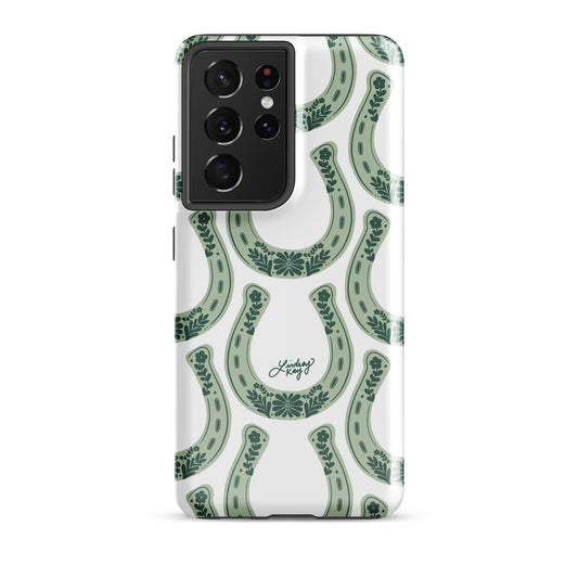 Country western Samsung phone case with hand drawn green horseshoe pattern by Lindsey Kay Collective. Tough, durable case available in all Samsung sizes. Perfect for cowgirls, rodeo lovers, and Texas sorority girls. Stylish protective phone accessory with southern flair.