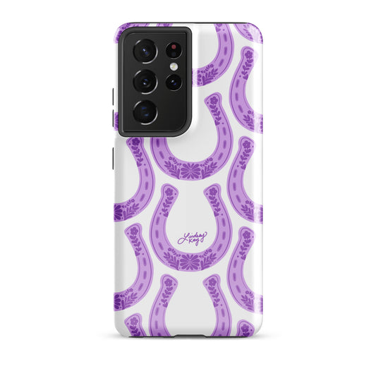Country western Samsung phone case with hand drawn purple horseshoe pattern by Lindsey Kay Collective. Tough, durable case available in all Samsung sizes. Perfect for cowgirls, rodeo lovers, and Texas sorority girls. Stylish protective phone accessory with southern flair.