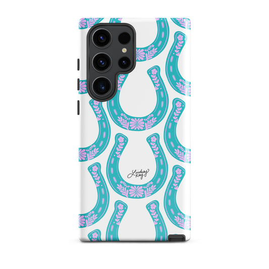 Country western Samsung phone case with hand drawn turquoise horseshoe pattern by Lindsey Kay Collective. Tough, durable case available in all Samsung sizes. Perfect for cowgirls, rodeo lovers, and Texas sorority girls. Stylish protective phone accessory with southern flair.