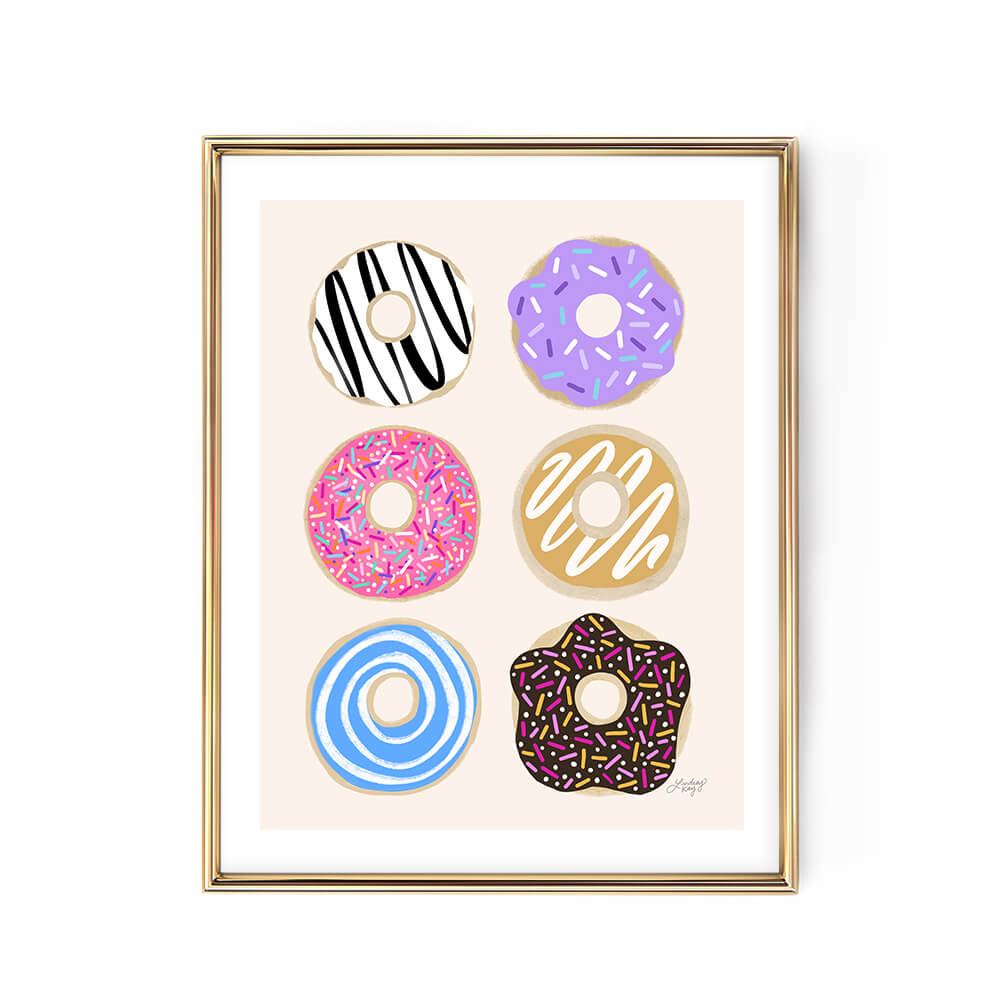 Hand-illustrated colorful donuts art print by Lindsey Kay Collective – 6 vibrant pastel donuts wall decor for kitchens, bakeries, gallery walls, or dorm rooms – printed on enhanced matte paper with bright inks – available in 10 sizes – trendy donut lover wall art poster