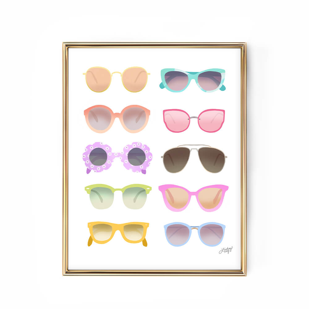 Pastel art print featuring hand-illustrated retro sunglasses, combining playful colors and vintage flair for a bold, trendy wall decor statement. Created by Lindsey Kay Collective.