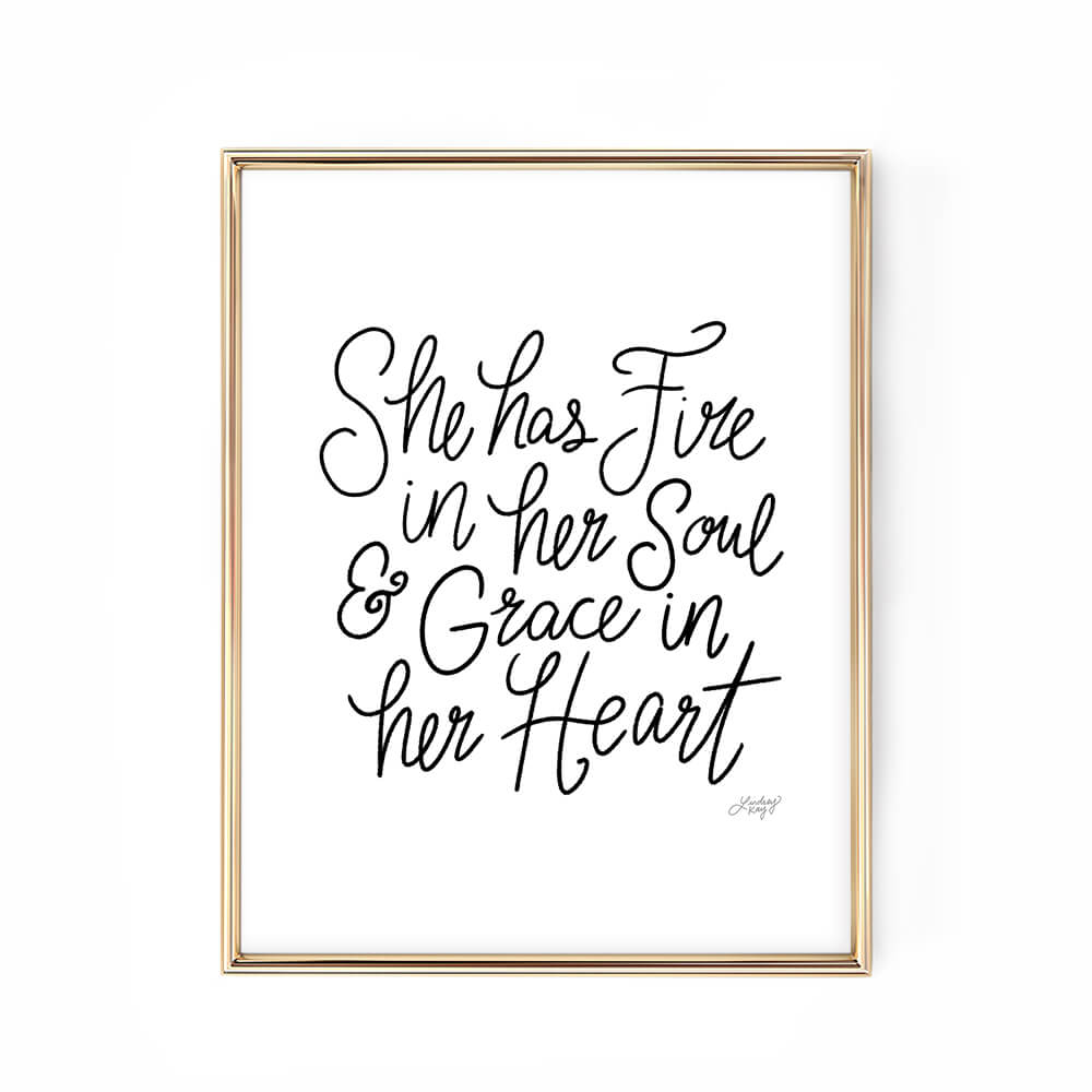 Hand-lettered She Has Grace in Her Heart and Fire in Her Soul art print by Lindsey Kay Collective – inspirational black and white wall art – perfect for nurseries, female office decor, dorm rooms, or empowering gallery walls – printed on enhanced matte paper with vibrant inks – available in 10 sizes