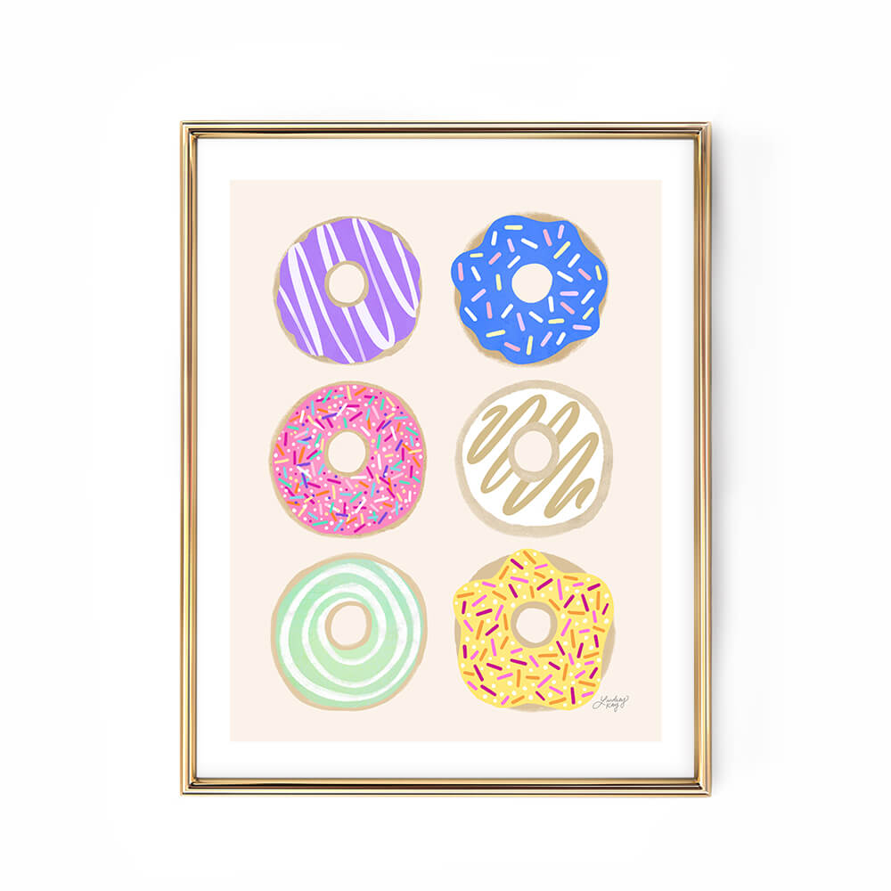 Hand-illustrated colorful donuts art print by Lindsey Kay Collective – 6 vibrant pastel donuts wall decor for kitchens, bakeries, gallery walls, or dorm rooms – printed on enhanced matte paper with bright inks – available in 10 sizes – trendy donut lover wall art poster