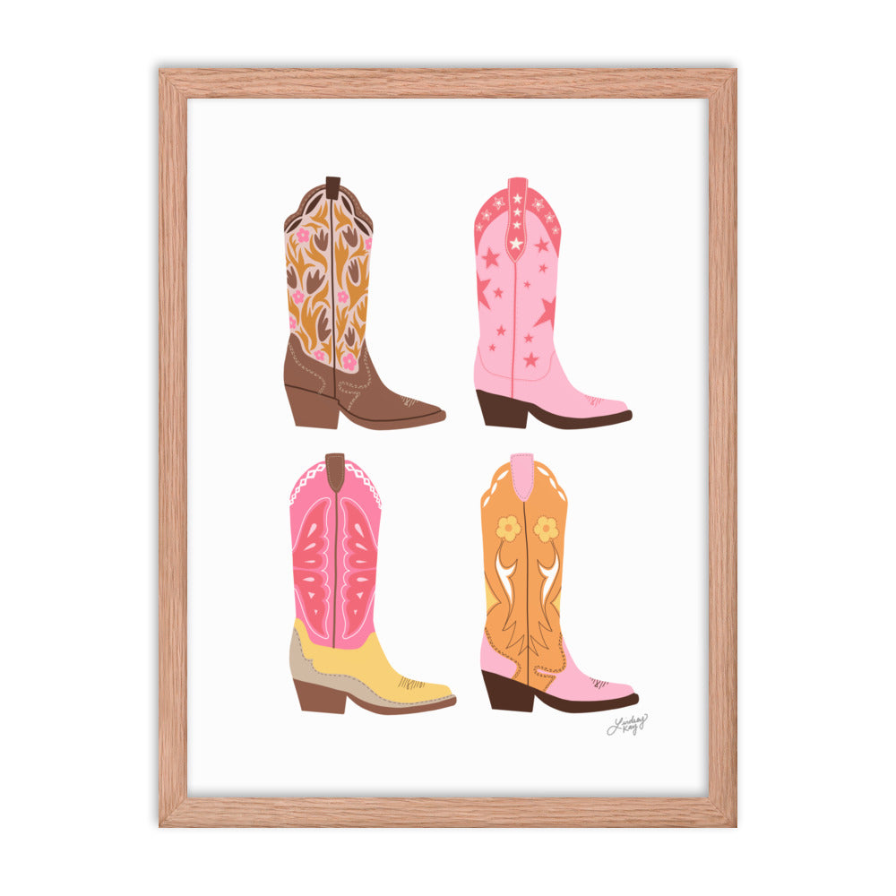 Framed hand-illustrated pastel cowgirl boots art print on matte paper, available in white, black, or brown wood frame, Western wall decor for rustic or boho spaces.