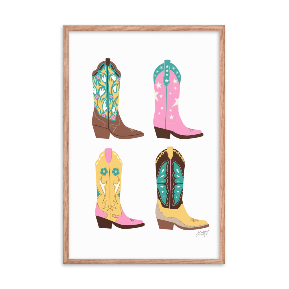 Framed hand-illustrated pastel cowgirl boots art print on matte paper, available in white, black, or brown wood frame, Western wall decor for rustic or boho spaces.