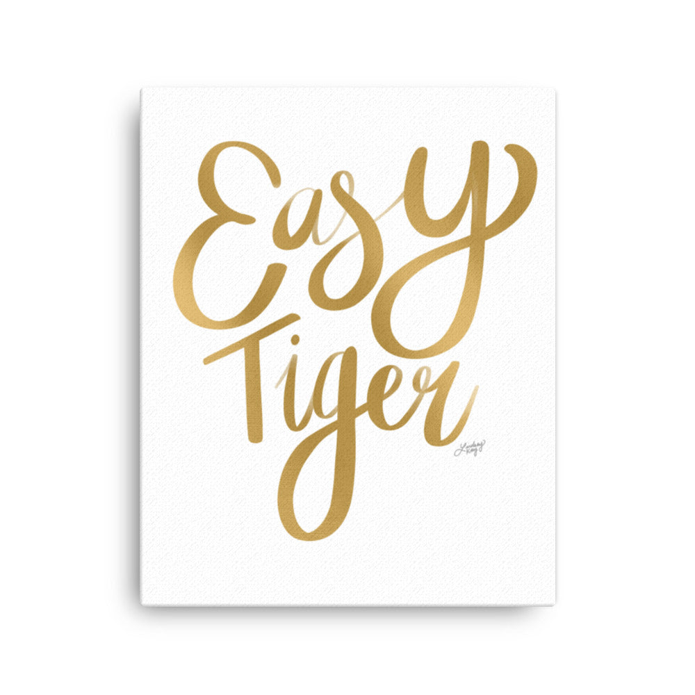 hand-lettered gold canvas that says Easy Tiger design by lindsey kay collective